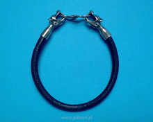 Leather bracelet with silver wolf heads