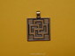 Slavic pendant with swastika from Kruszwica, Poland