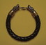 Leather bracelet with bronze wolf heads