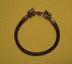Leather bracelet with bronze wolf heads